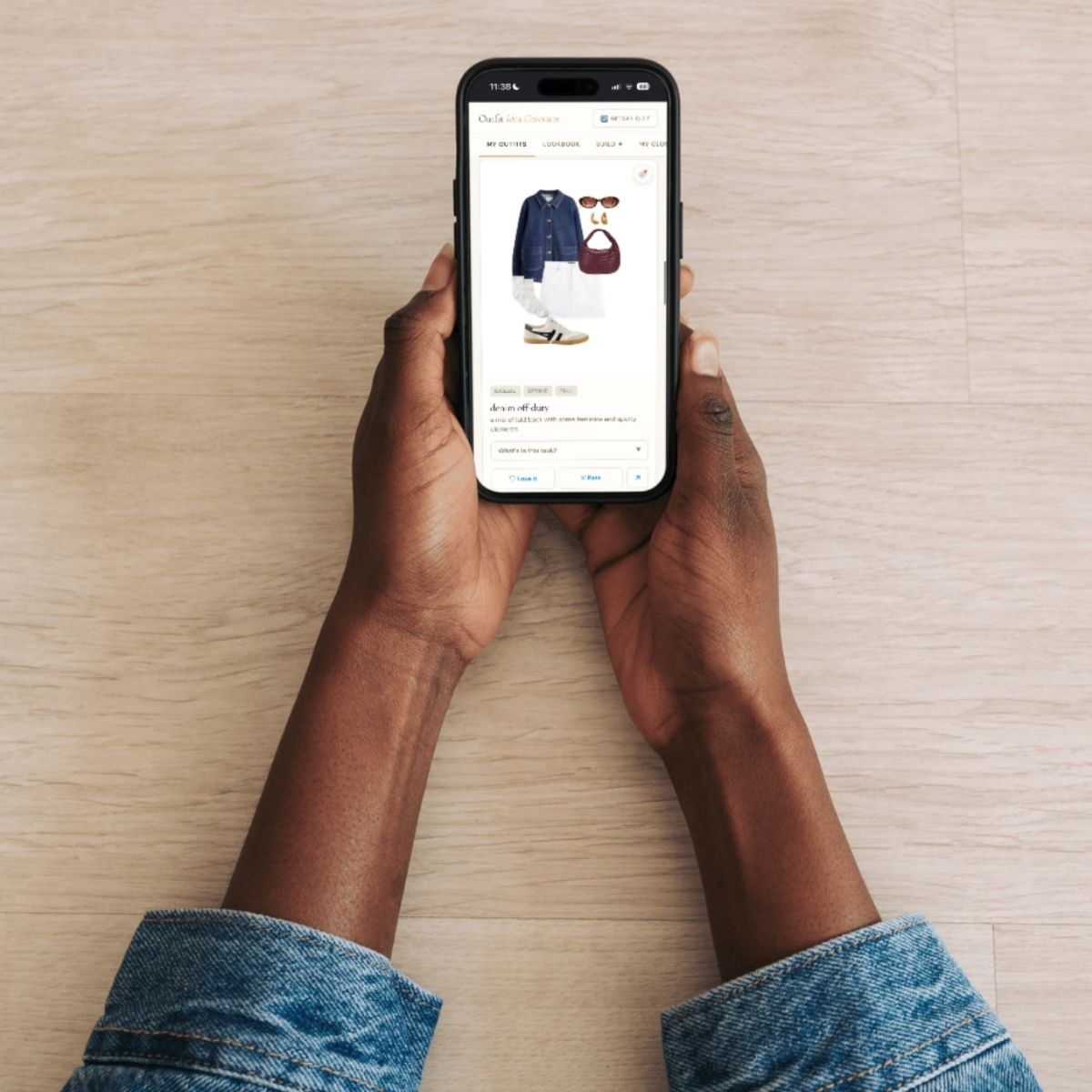 The Outfit Vault on phone